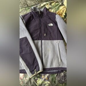 Purple North Face jacket.